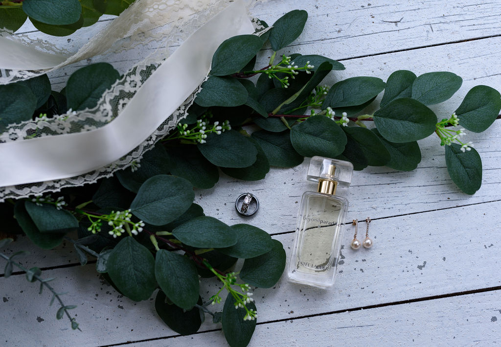 details of greenery, rings, and perfume at south laurel farms